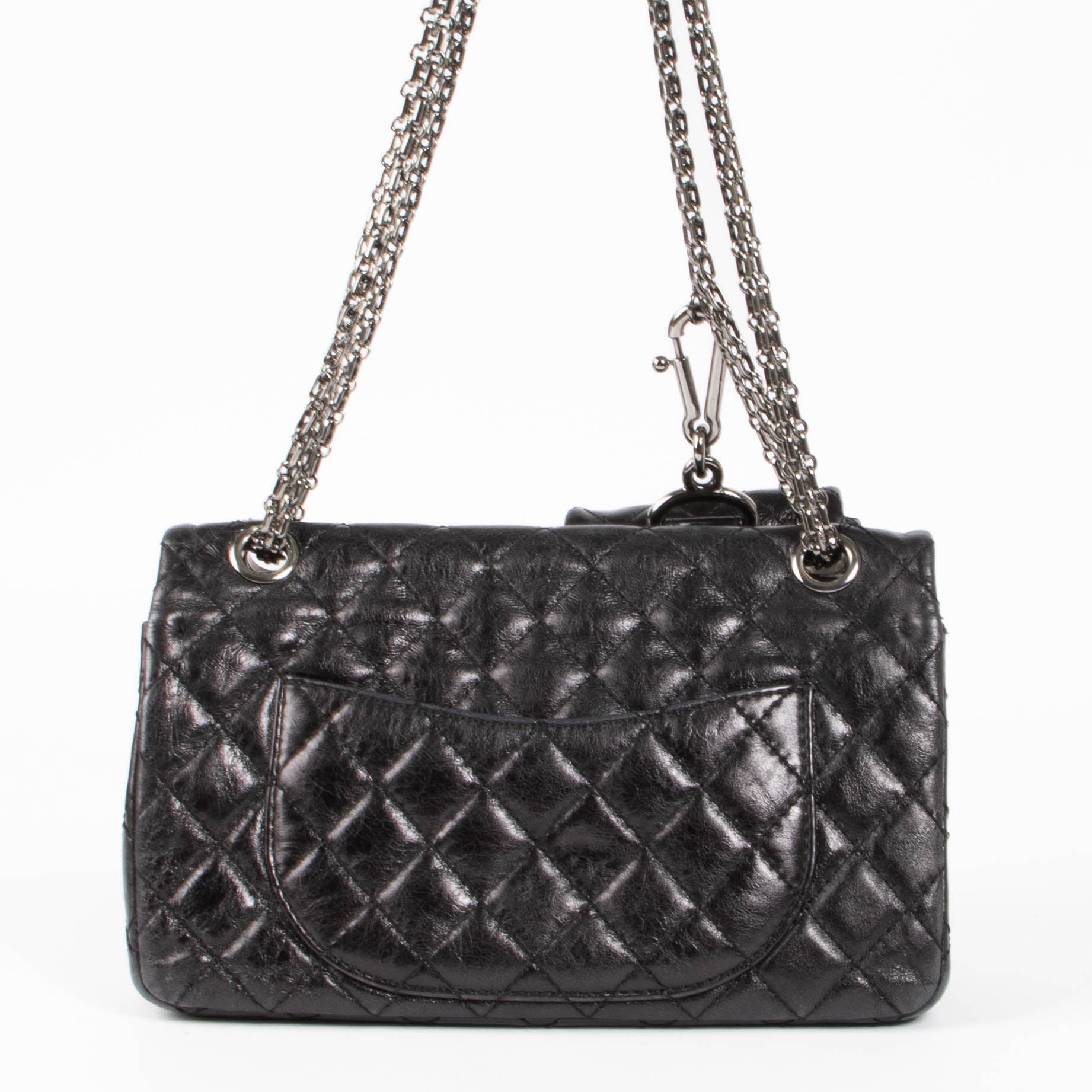 Shop this authentic Chanel Black Aged Calfskin Medium 2.55 Reissue Bag with Micro Pouch pre-loved on Labellov.com 