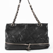 Shop this authentic Chanel Black Stitched Expandable Shoulder Bag pre-loved on Labellov.com 