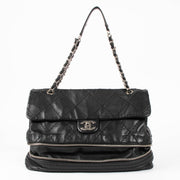 Shop this authentic Chanel Black Stitched Expandable Shoulder Bag pre-loved on Labellov.com 