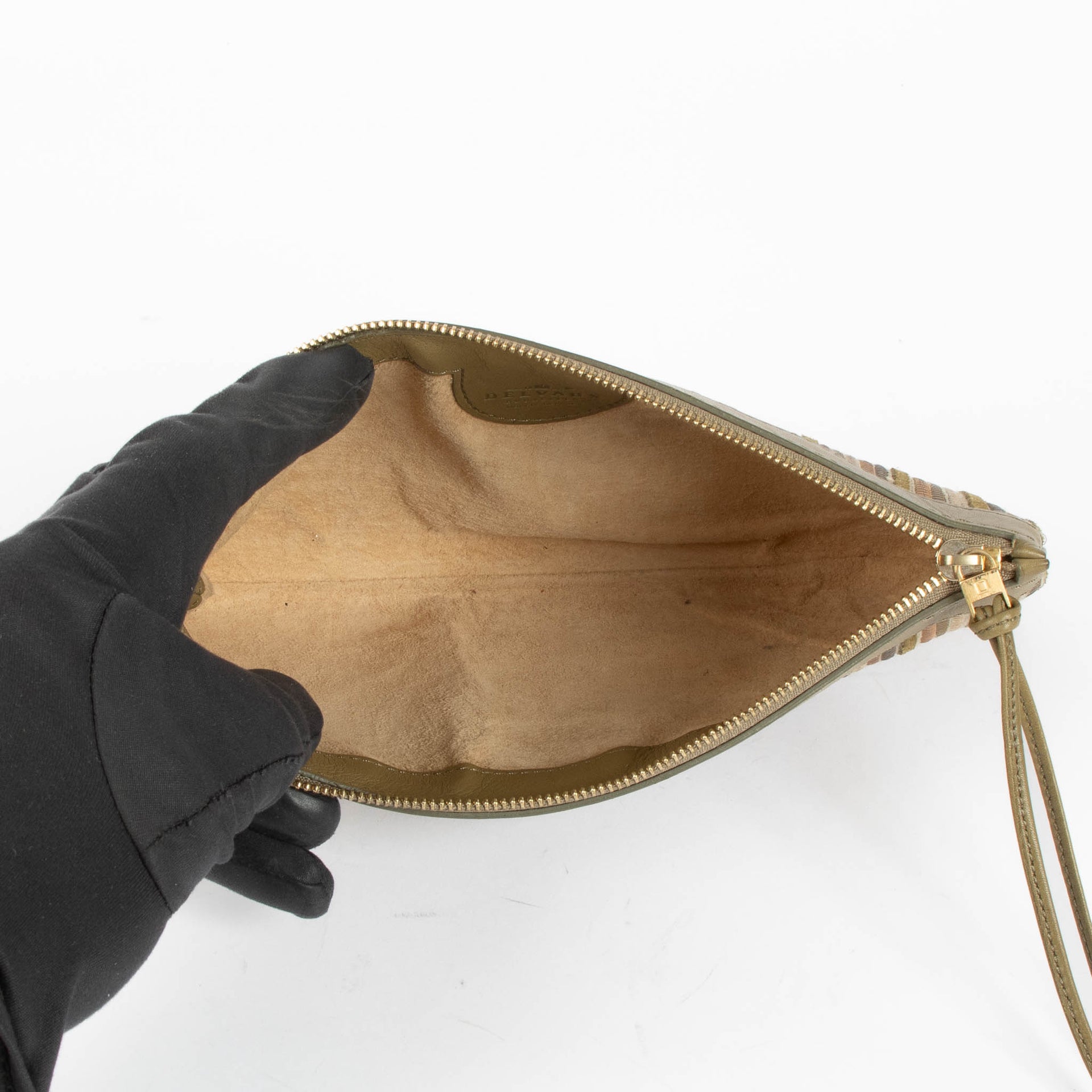 Shop this authentic Delvaux Brown Multicolor oile de Cuir Pouch pre-loved on Labellov.com 