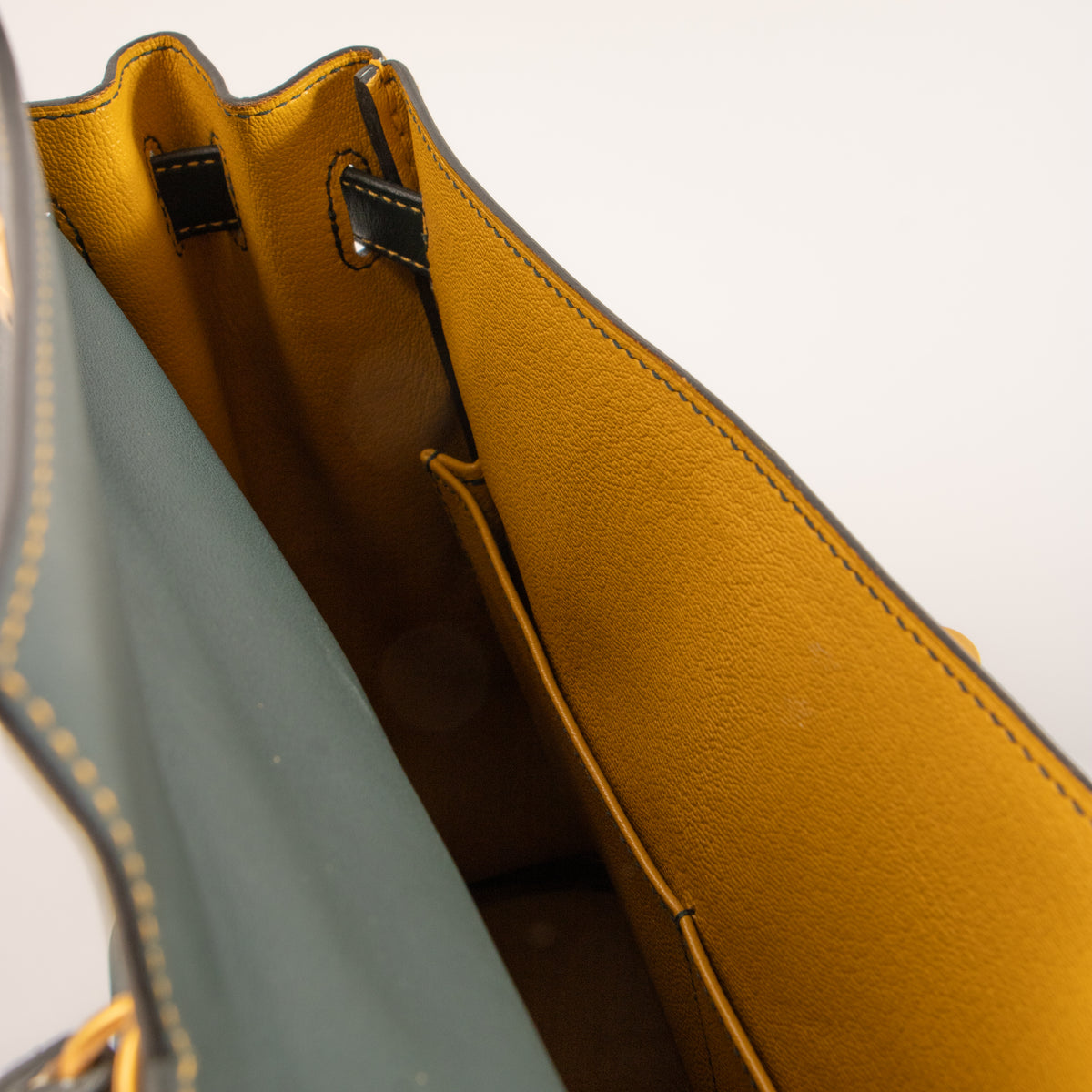 Shop this authentic Hermes HSS Kelly 32 Vert Cypress/Jaune Ambre Swift BGHW pre-loved on Labellov.com