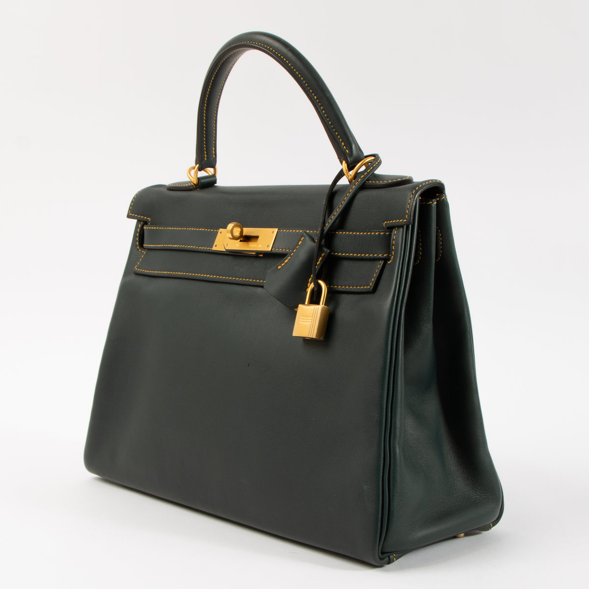 Shop this authentic Hermes HSS Kelly 32 Vert Cypress/Jaune Ambre Swift BGHW pre-loved on Labellov.com