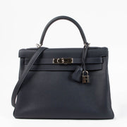 Shop the authentic Hermes Kelly 32 Bleu Nuit PHW second hand on Labellov.com
