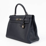 Shop the authentic Hermes Kelly 32 Bleu Nuit PHW second hand on Labellov.comv