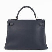 Shop the authentic Hermes Kelly 32 Bleu Nuit PHW second hand on Labellov.com