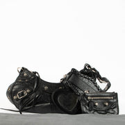 Shop this 100% authentic Balenciaga Black Arena Le Cagole XS Bag at Labellov.com.