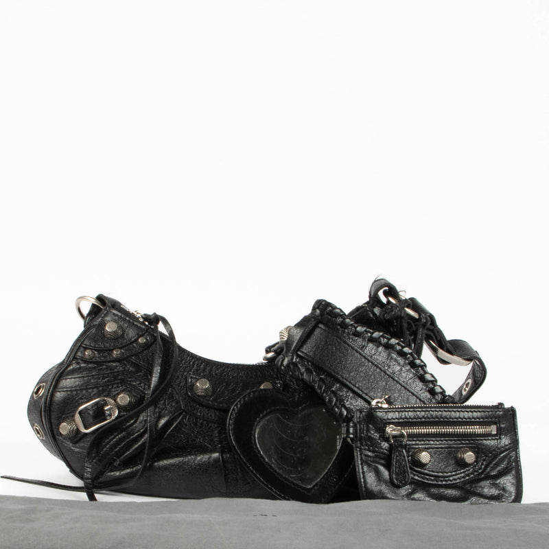 Shop this 100% authentic Balenciaga Black Arena Le Cagole XS Bag at Labellov.com.