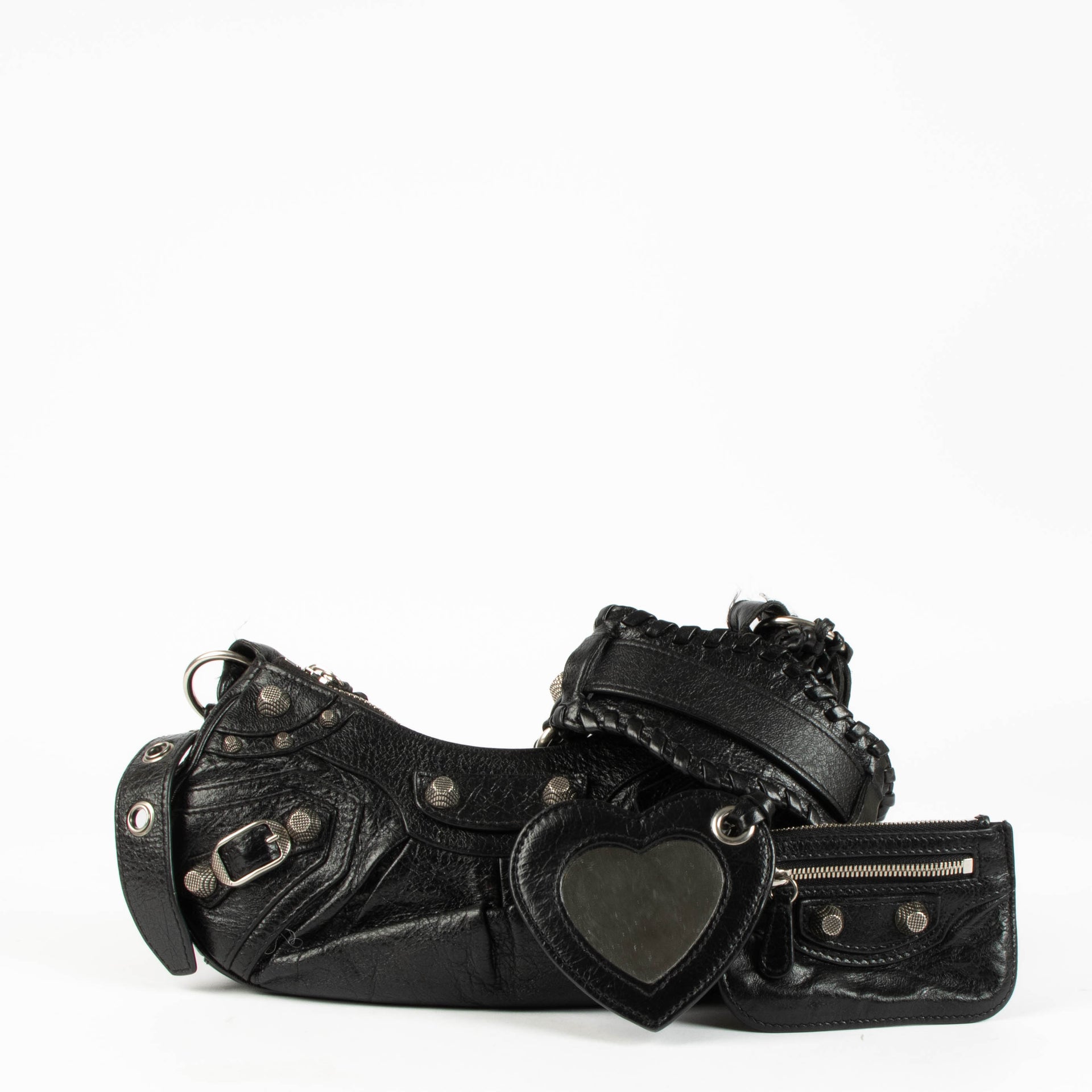 Shop this 100% authentic Balenciaga Black Arena Le Cagole XS Bag at Labellov.com.