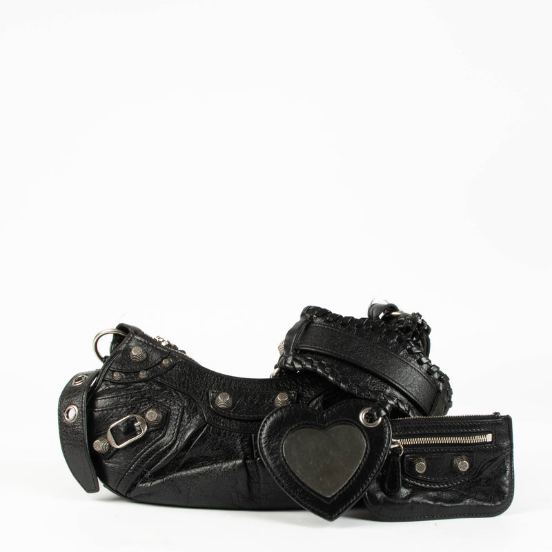 Shop this 100% authentic Balenciaga Black Arena Le Cagole XS Bag at Labellov.com.