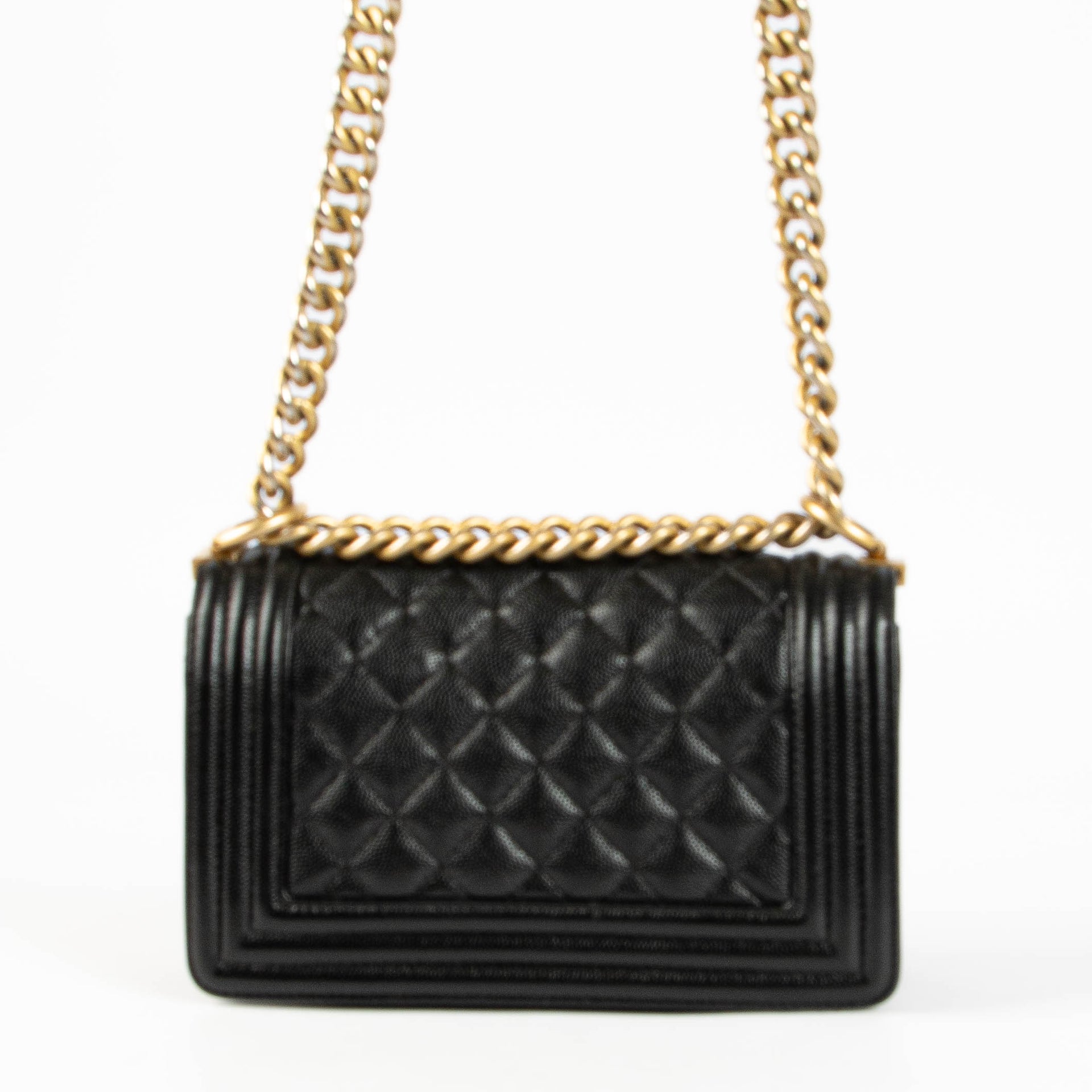 Shop this 100% authentic Chanel Black Caviar Small Boy Chanel Bag at Labellov.com