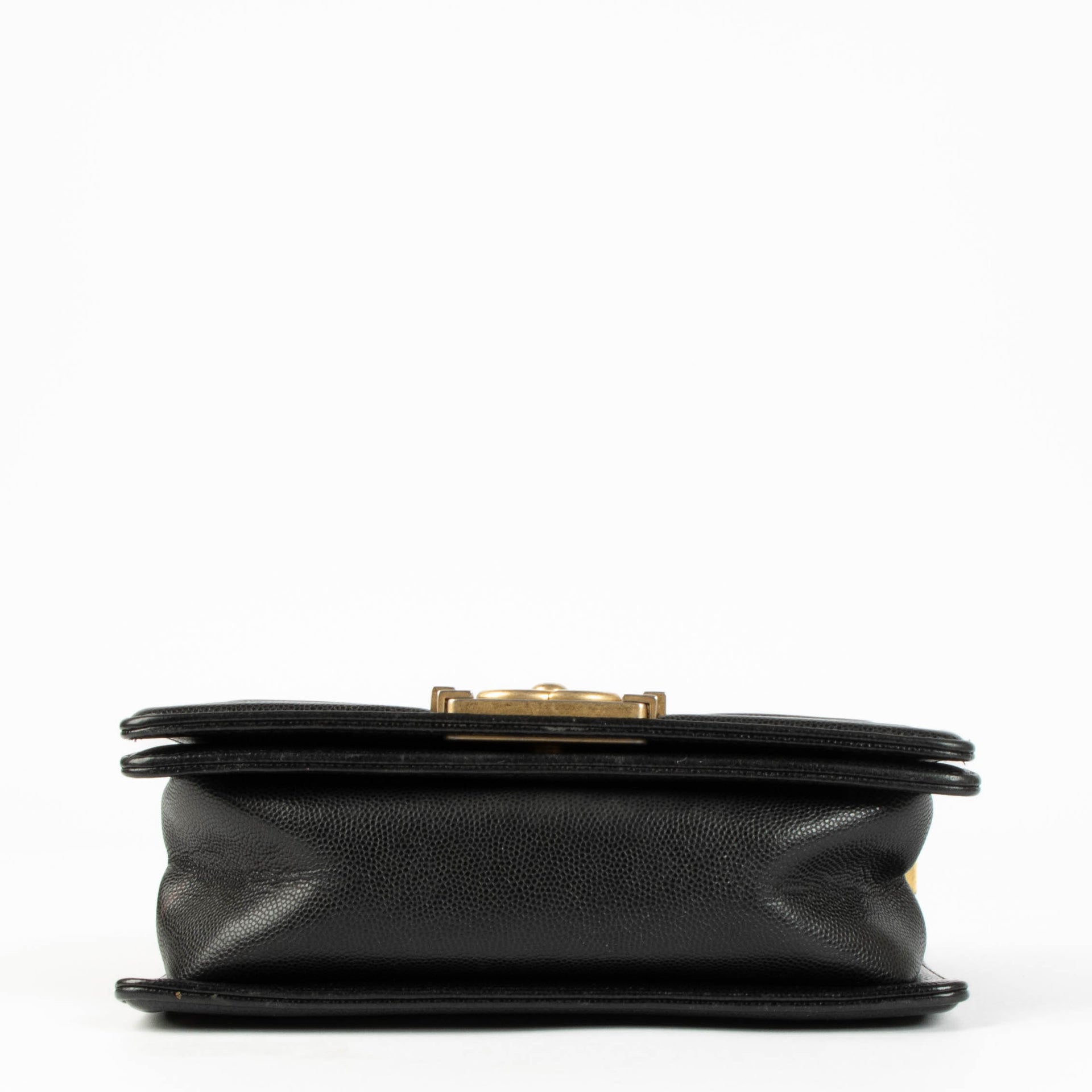 Shop this 100% authentic Chanel Black Caviar Small Boy Chanel Bag at Labellov.com