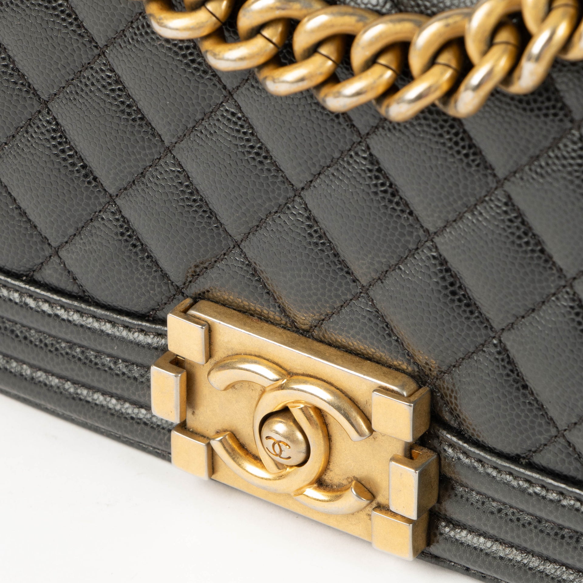 Shop this 100% authentic Chanel Black Caviar Small Boy Chanel Bag at Labellov.com