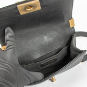 Shop this 100% authentic Chanel Black Caviar Small Boy Chanel Bag at Labellov.com
