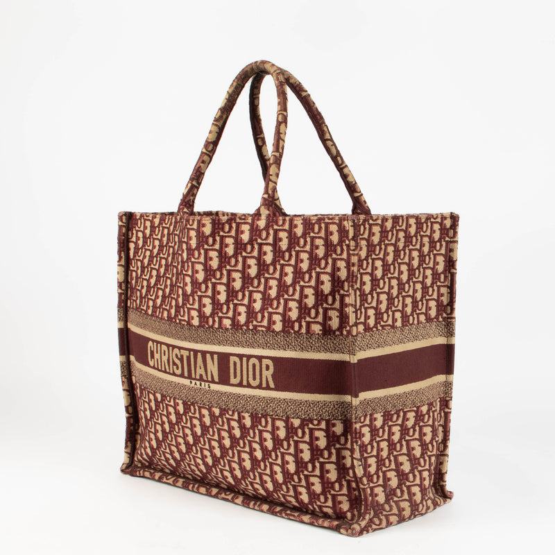 Shop this 100% authentic Christian Dior Burgundy Oblique Large Book Tote Bag at Labellov.com