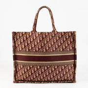 Shop this 100% authentic Christian Dior Burgundy Oblique Large Book Tote Bag at Labellov.com