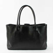 Shop this authentic Chanel Black Leather Medium Executive Tote Bag pre-loved on Labellov.com 