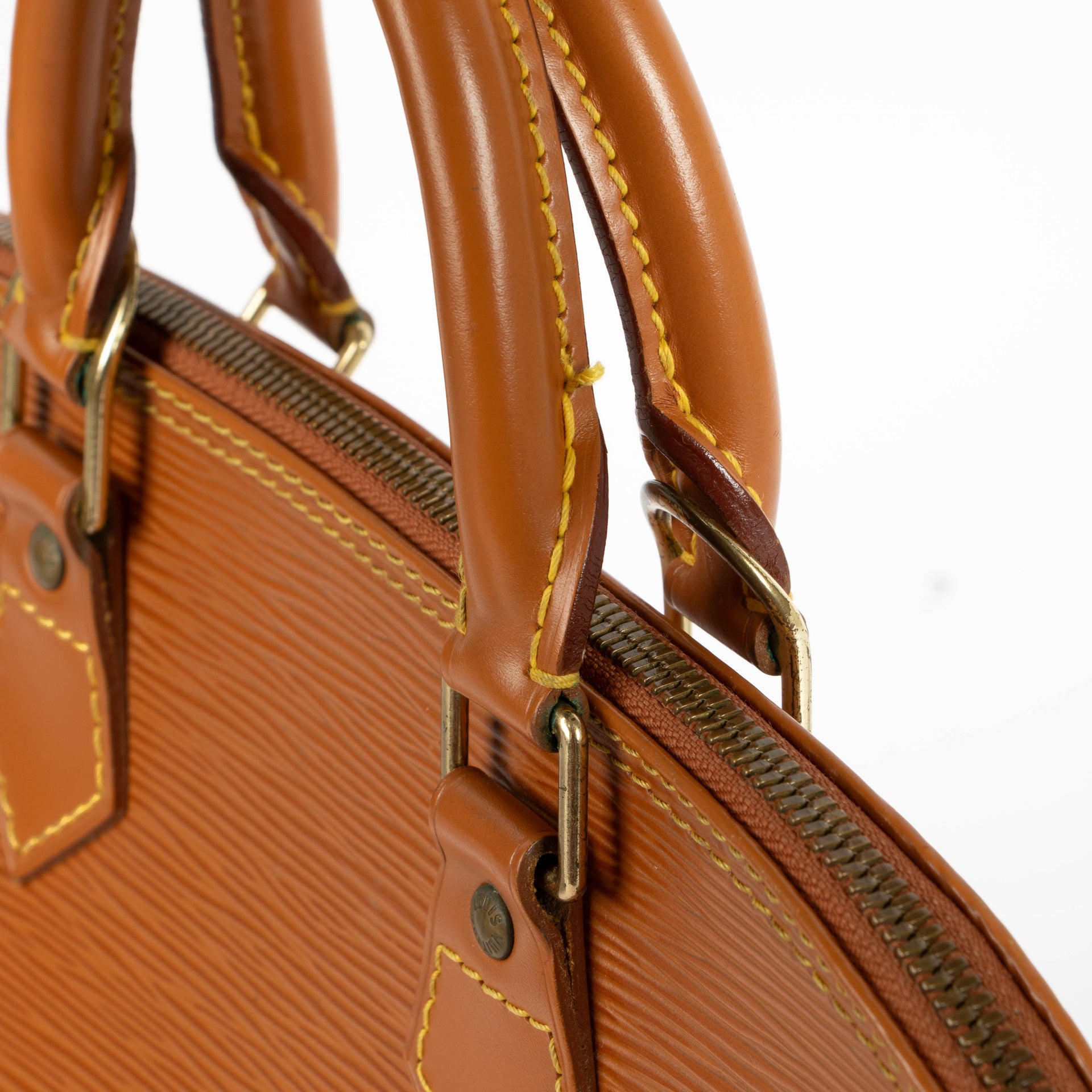 Shop the authentic Louis Vuitton Alma Epi PM Top Handle second hand on Labellov.com