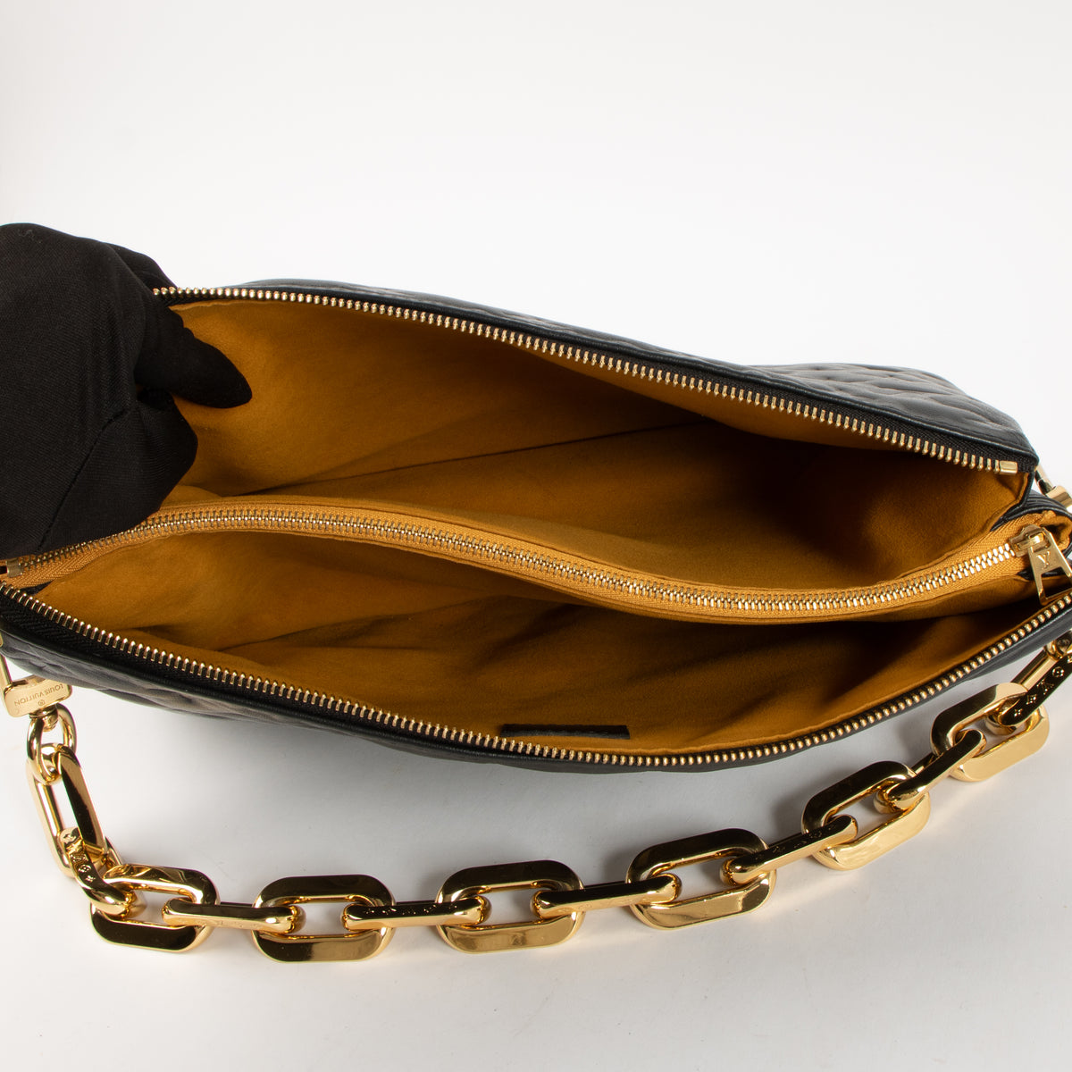 Shop this authentic luxury Louis Vuitton Black Cousin GM Bag Pre-Loved on Labellov.com