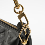 Shop this authentic luxury Louis Vuitton Black Cousin GM Bag Pre-Loved on Labellov.com