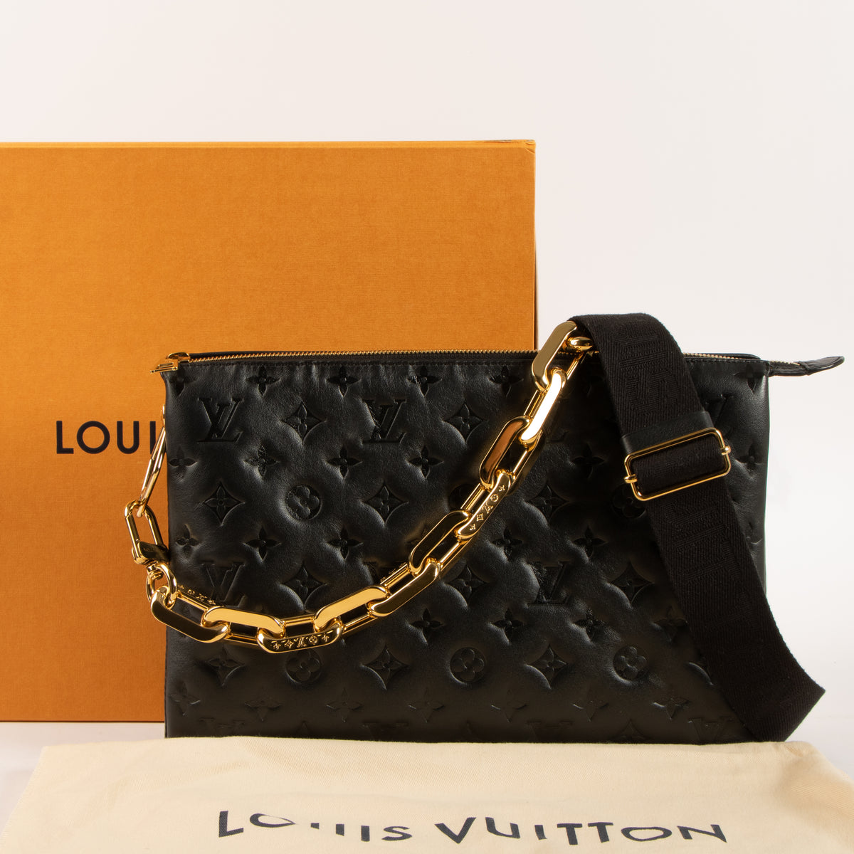 Shop this authentic luxury Louis Vuitton Black Cousin GM Bag Pre-Loved on Labellov.com