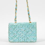 Shop this authentic Chanel 1980s Blue Sequin Micro Flap Bag pre-loved on Labellov.com