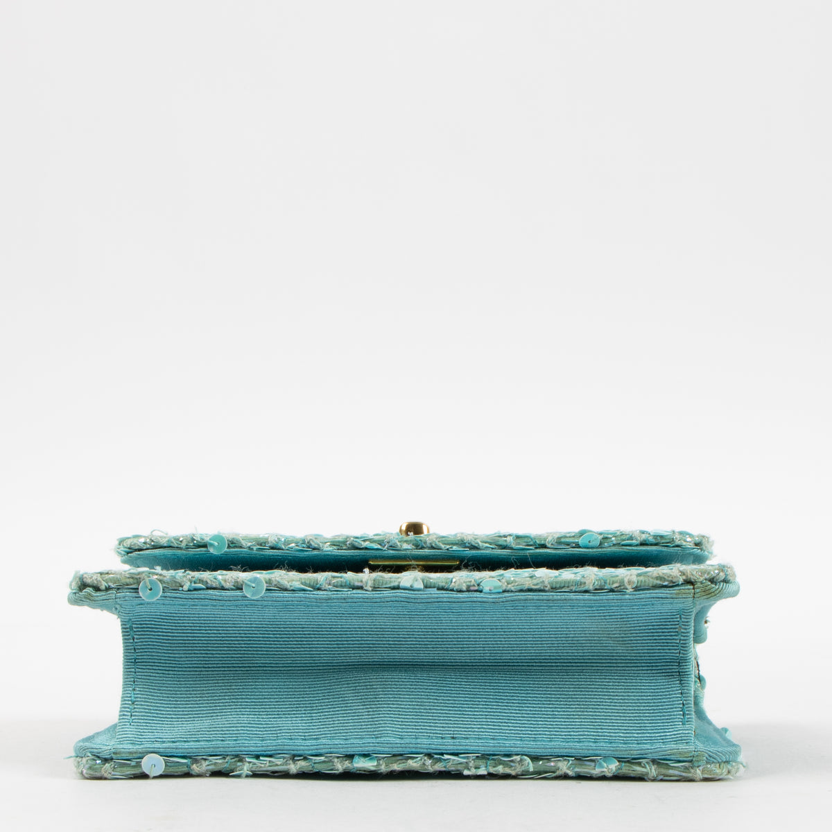 Shop this authentic Chanel 1980s Blue Sequin Micro Flap Bag pre-loved on Labellov.com