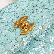 Shop this authentic Chanel 1980s Blue Sequin Micro Flap Bag pre-loved on Labellov.com