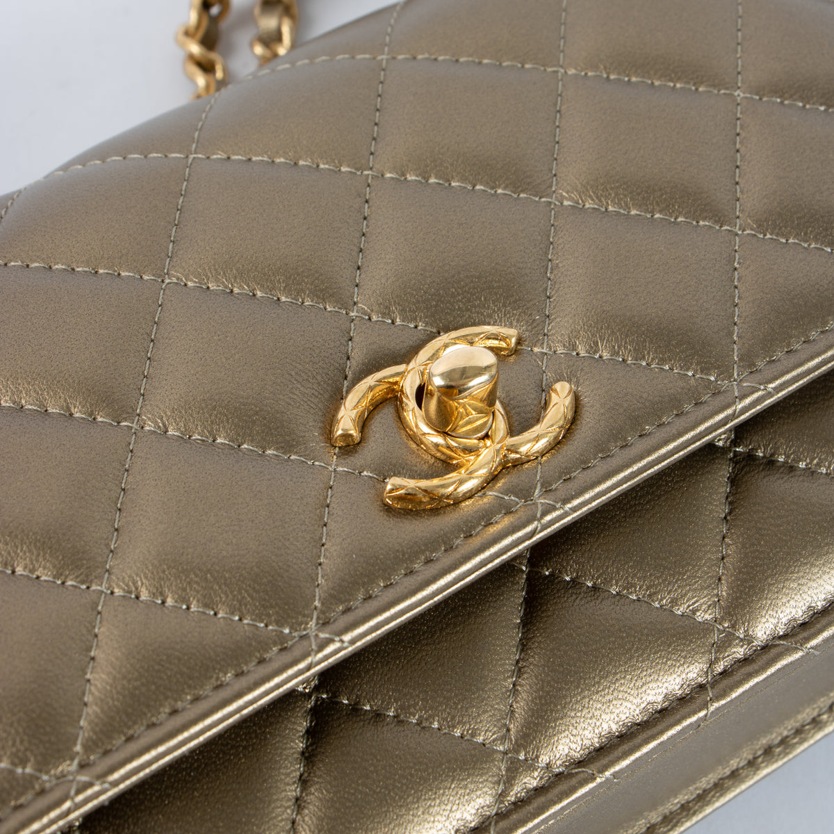 Shop this authentic Chanel Gold Lambskin Wallet On Chain pre-loved on Labellov.com