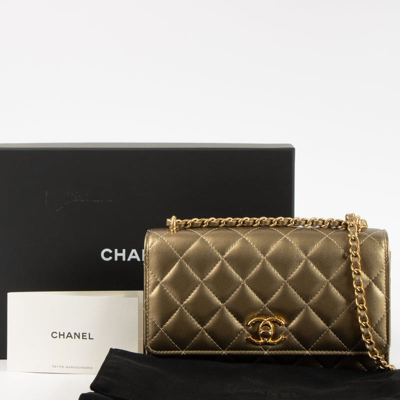 Shop this authentic Chanel Gold Lambskin Wallet On Chain pre-loved on Labellov.com