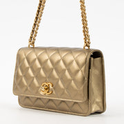 Shop this authentic Chanel Gold Lambskin Wallet On Chain pre-loved on Labellov.com