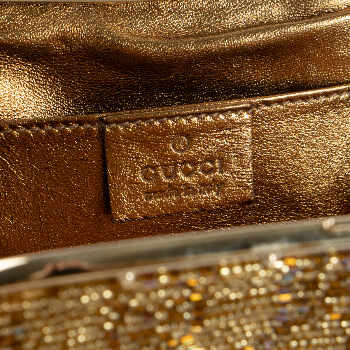 Shop this authentic Gucci Gold Beaded GG Frame Clutch pre-loved on Labellov.com