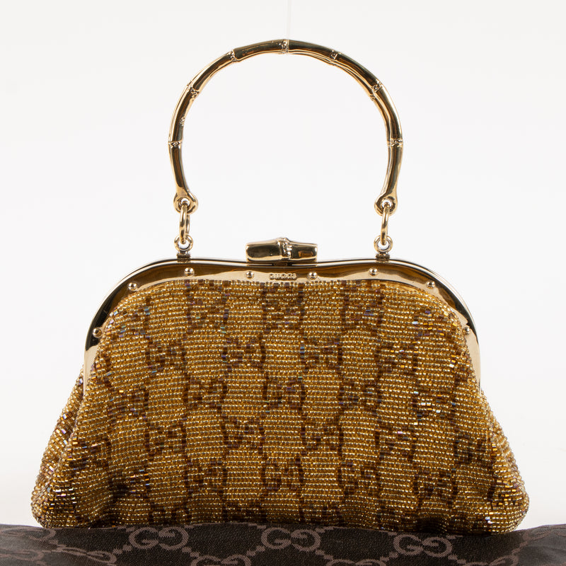 Shop this authentic Gucci Gold Beaded GG Frame Clutch pre-loved on Labellov.com