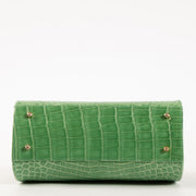 Shop this authentic Judith Leiber Green Shiny Alligator Frame Clutch Pre-Loved on Labellov.com