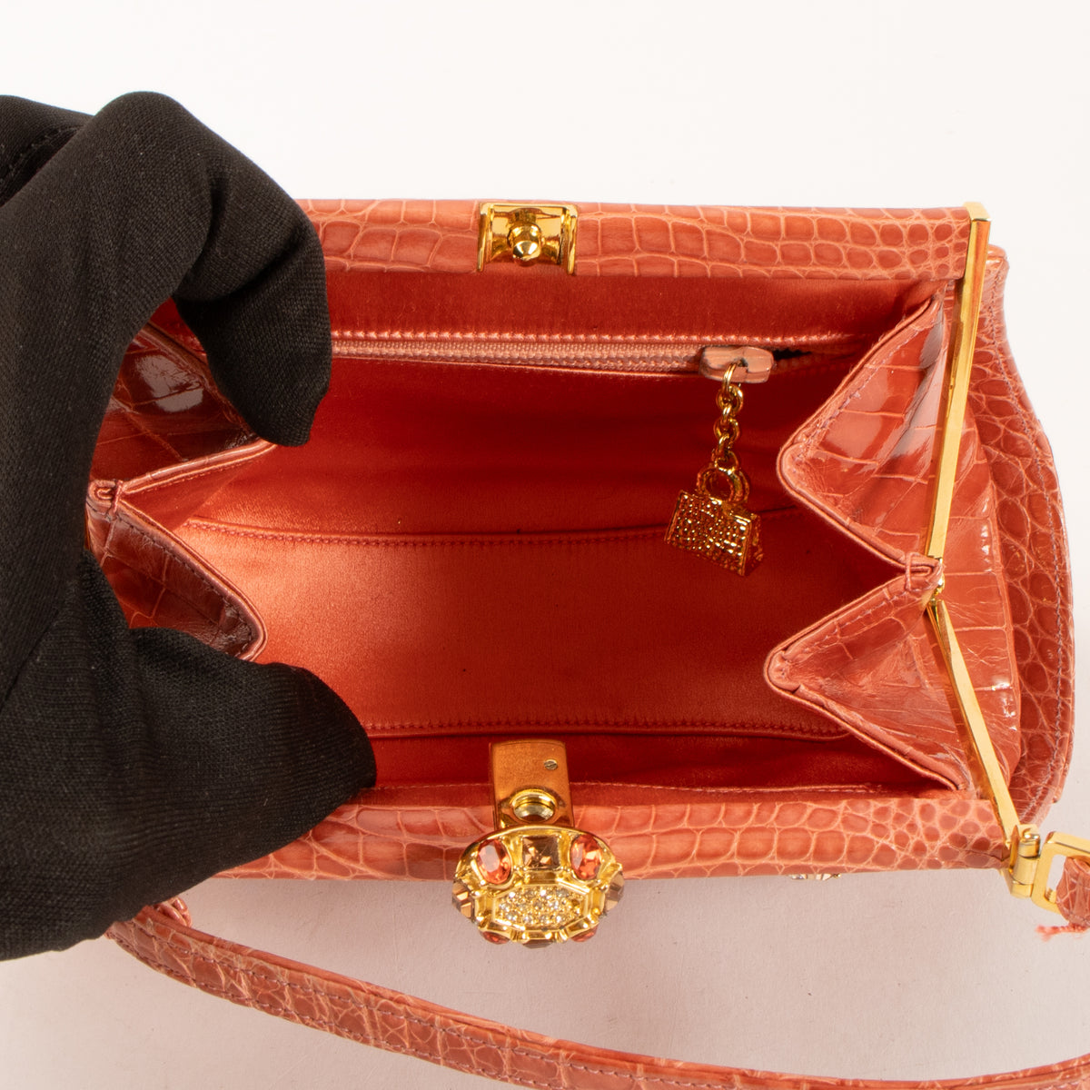 Shop this authentic Judith Leiber Old Rose Shiny Alligator Frame Clutch Pre-Loved on Labellov.com
