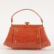 Shop this authentic Judith Leiber Old Rose Shiny Alligator Frame Clutch Pre-Loved on Labellov.com