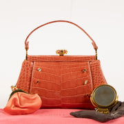Shop this authentic Judith Leiber Old Rose Shiny Alligator Frame Clutch Pre-Loved on Labellov.com