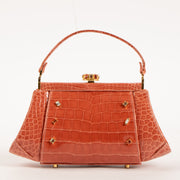 Shop this authentic Judith Leiber Old Rose Shiny Alligator Frame Clutch Pre-Loved on Labellov.com
