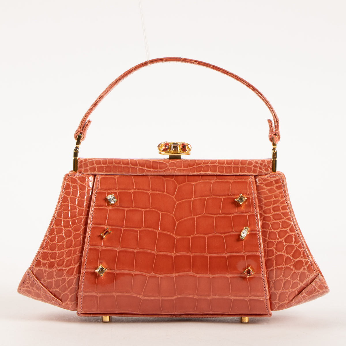 Shop this authentic Judith Leiber Old Rose Shiny Alligator Frame Clutch Pre-Loved on Labellov.com