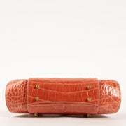 Shop this authentic Judith Leiber Old Rose Shiny Alligator Frame Clutch Pre-Loved on Labellov.com