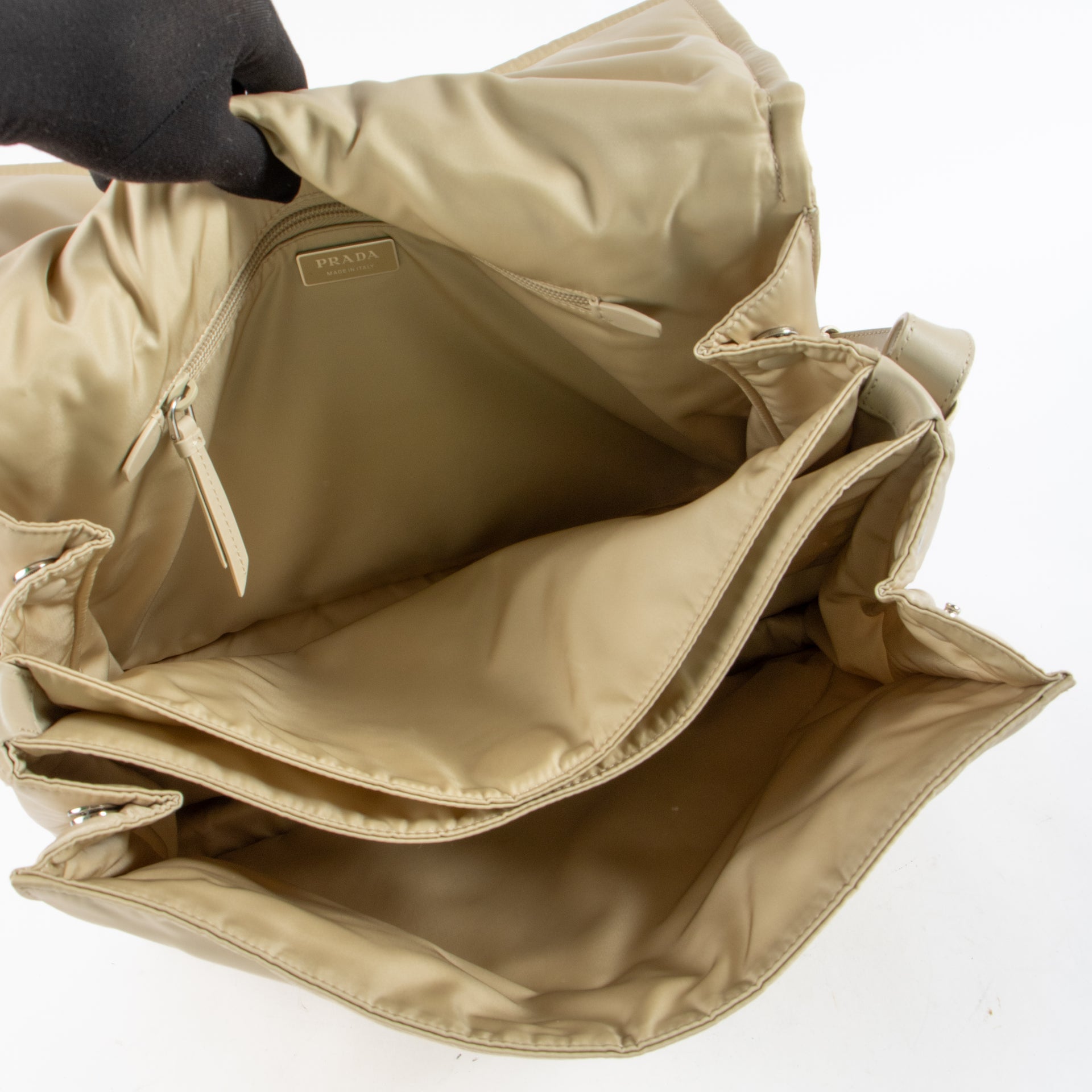 Shop the authentic Prada Beige Padded Re-Nylon Traveller Large Messenger Bag on Labellov.com !