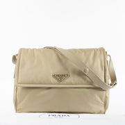 Shop the authentic Prada Beige Padded Re-Nylon Traveller Large Messenger Bag on Labellov.com !