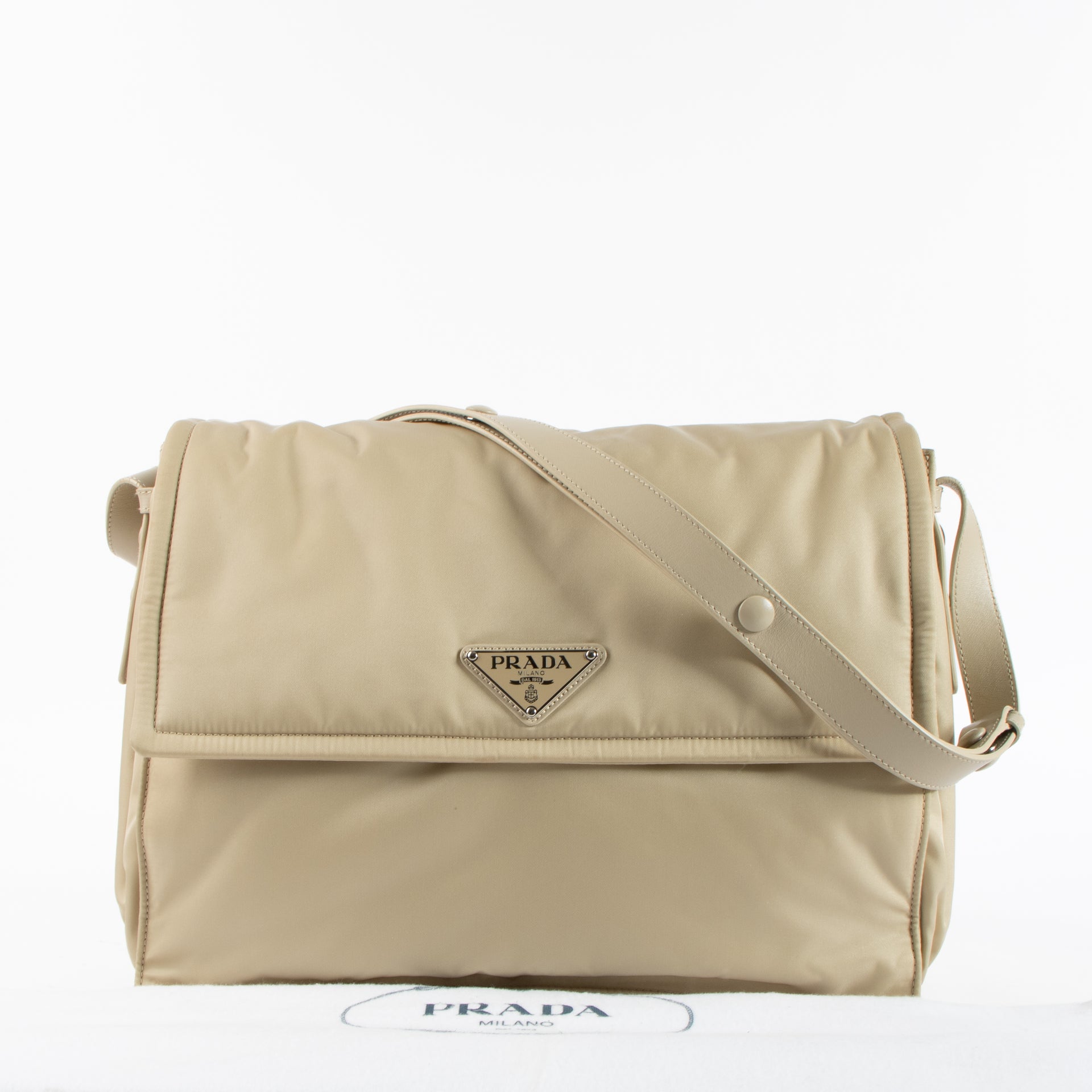 Shop the authentic Prada Beige Padded Re-Nylon Traveller Large Messenger Bag on Labellov.com !