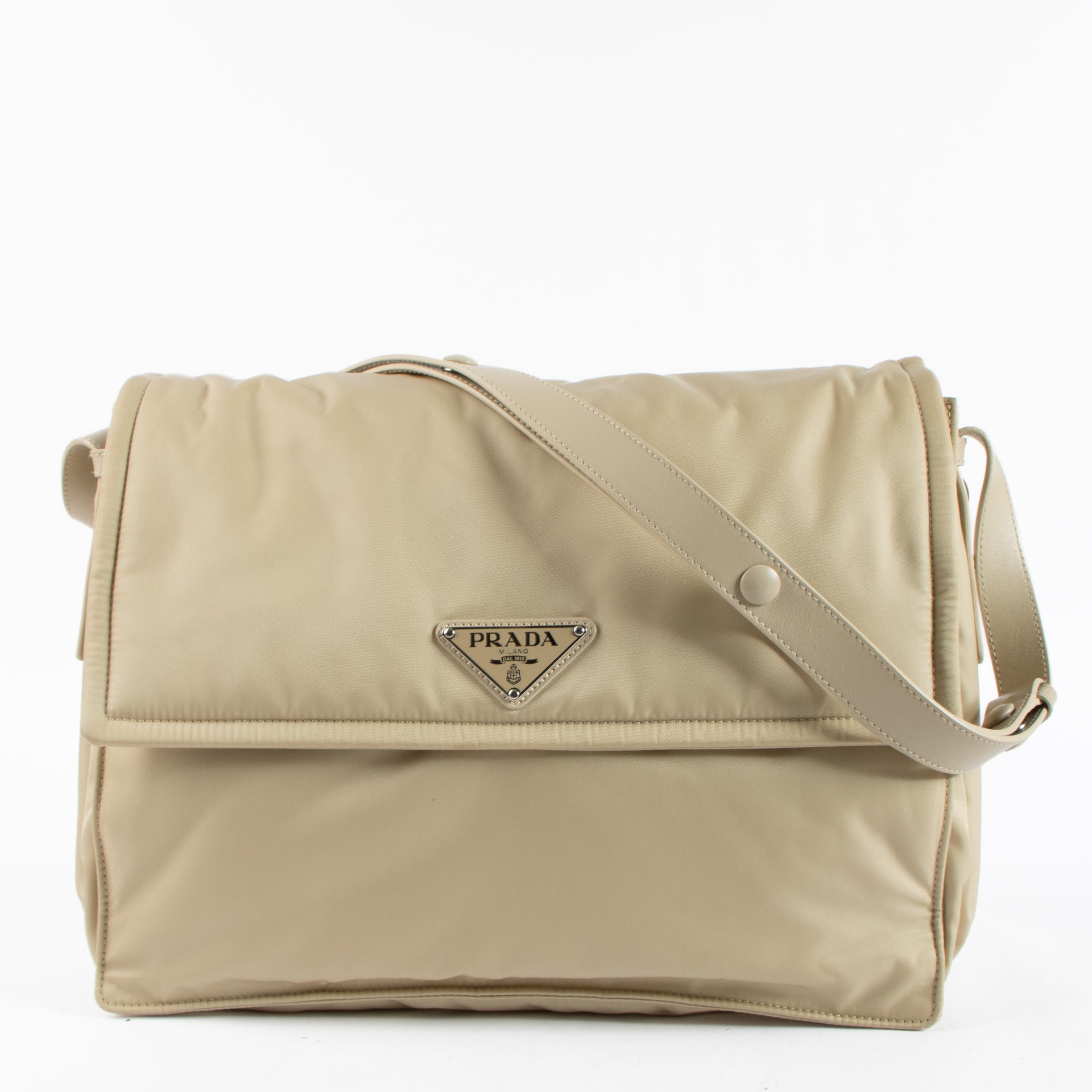 Shop the authentic Prada Beige Padded Re-Nylon Traveller Large Messenger Bag on Labellov.com !