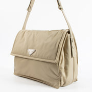 Shop the authentic Prada Beige Padded Re-Nylon Traveller Large Messenger Bag on Labellov.com !