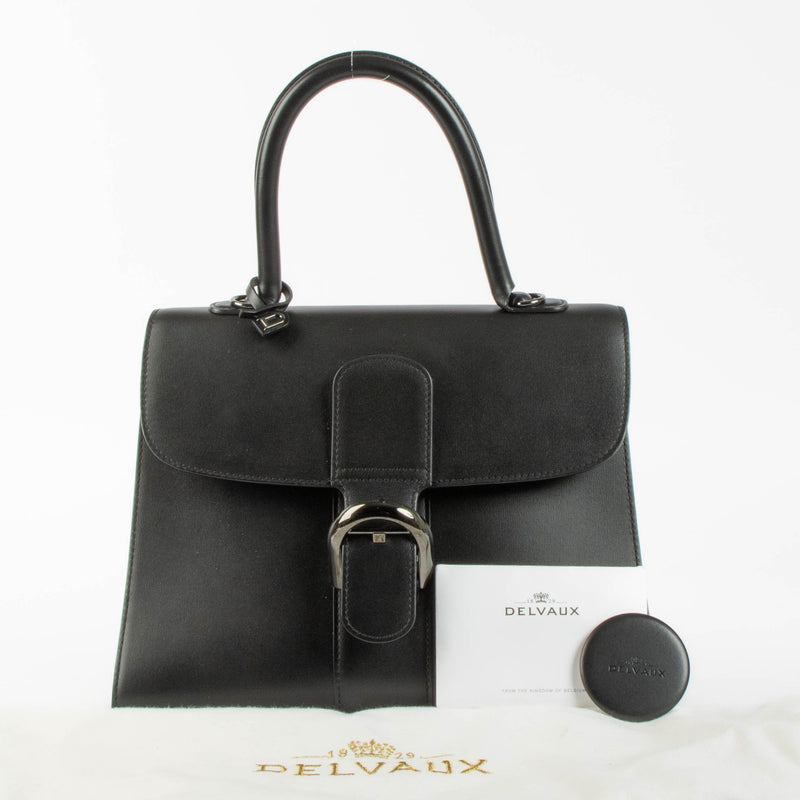 Shop this authentic Delvaux So Black Box Calf Brillant MM pre-loved on Labellov.com 