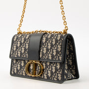 Shop this authentic Christian Dior Blue Oblique 30 Montaigne Chain Bag pre-loved on labellov.com