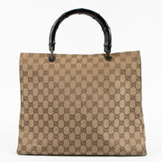 Shop the authentic Gucci GG Canvas Bamboo Handle Tote Bag on Labellov.com !