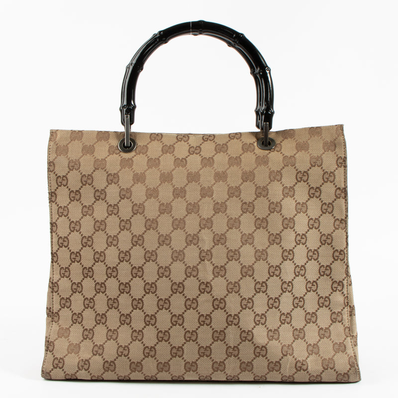 Shop the authentic Gucci GG Canvas Bamboo Handle Tote Bag on Labellov.com !