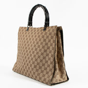 Shop the authentic Gucci GG Canvas Bamboo Handle Tote Bag on Labellov.com !