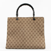 Shop the authentic Gucci GG Canvas Bamboo Handle Tote Bag on Labellov.com !